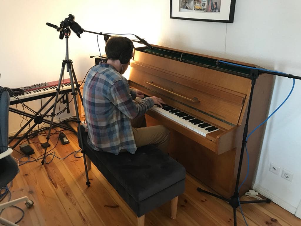Joshua Tindall playing piano